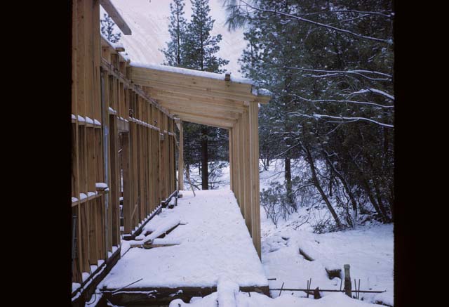 snowy path next to building