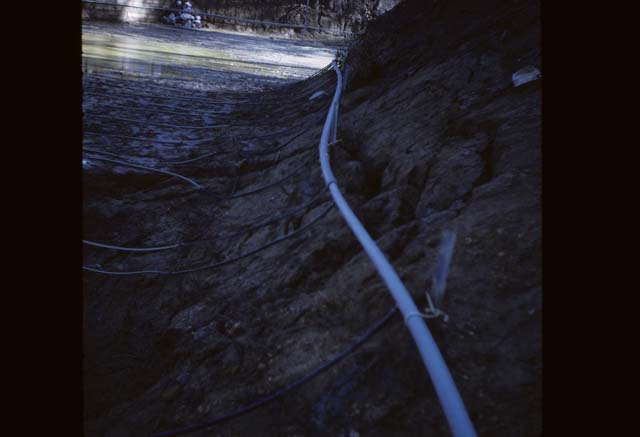 pipe next to pond