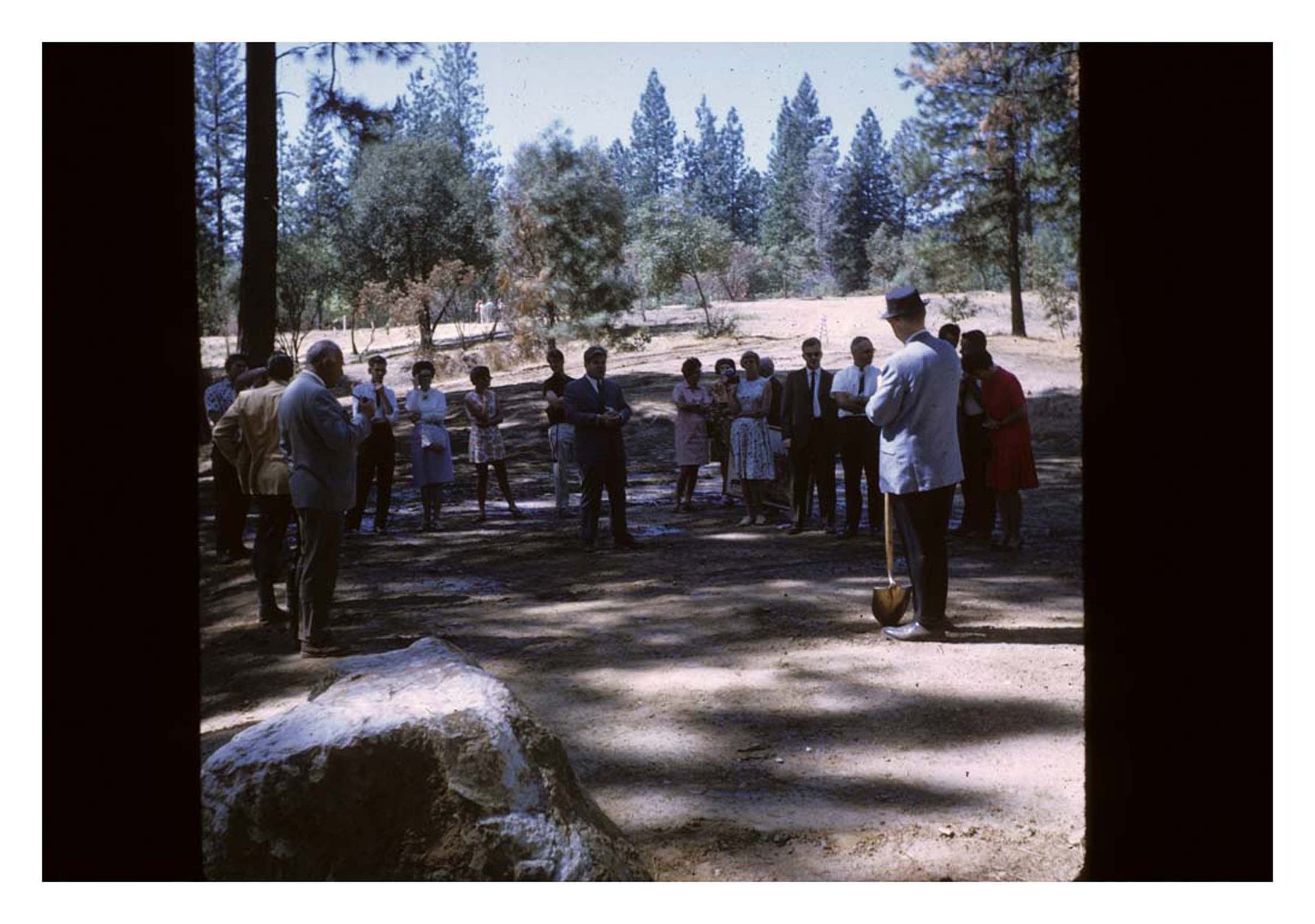 people standing around construction site