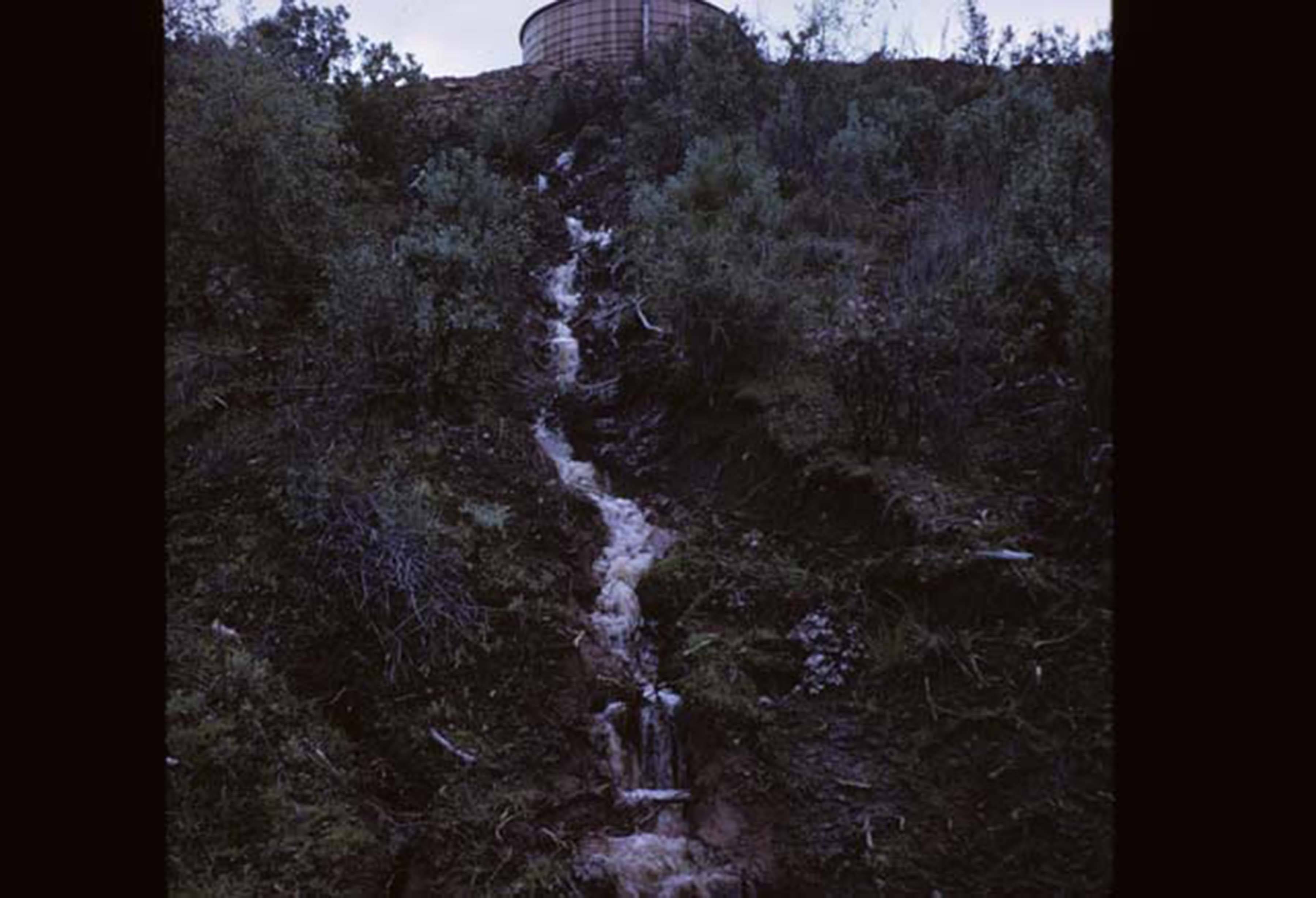 water coming down hill from water tower