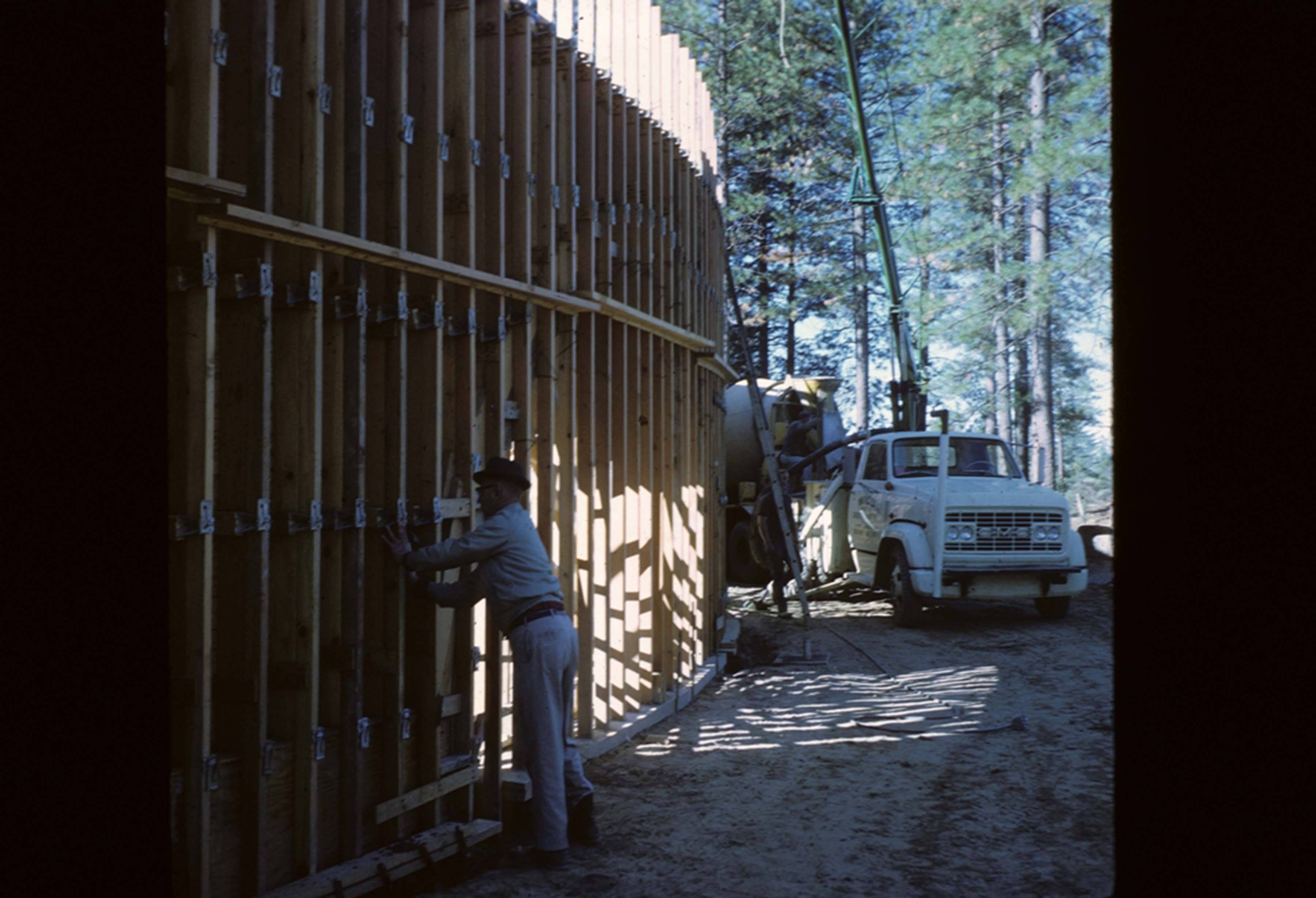 person working on studs