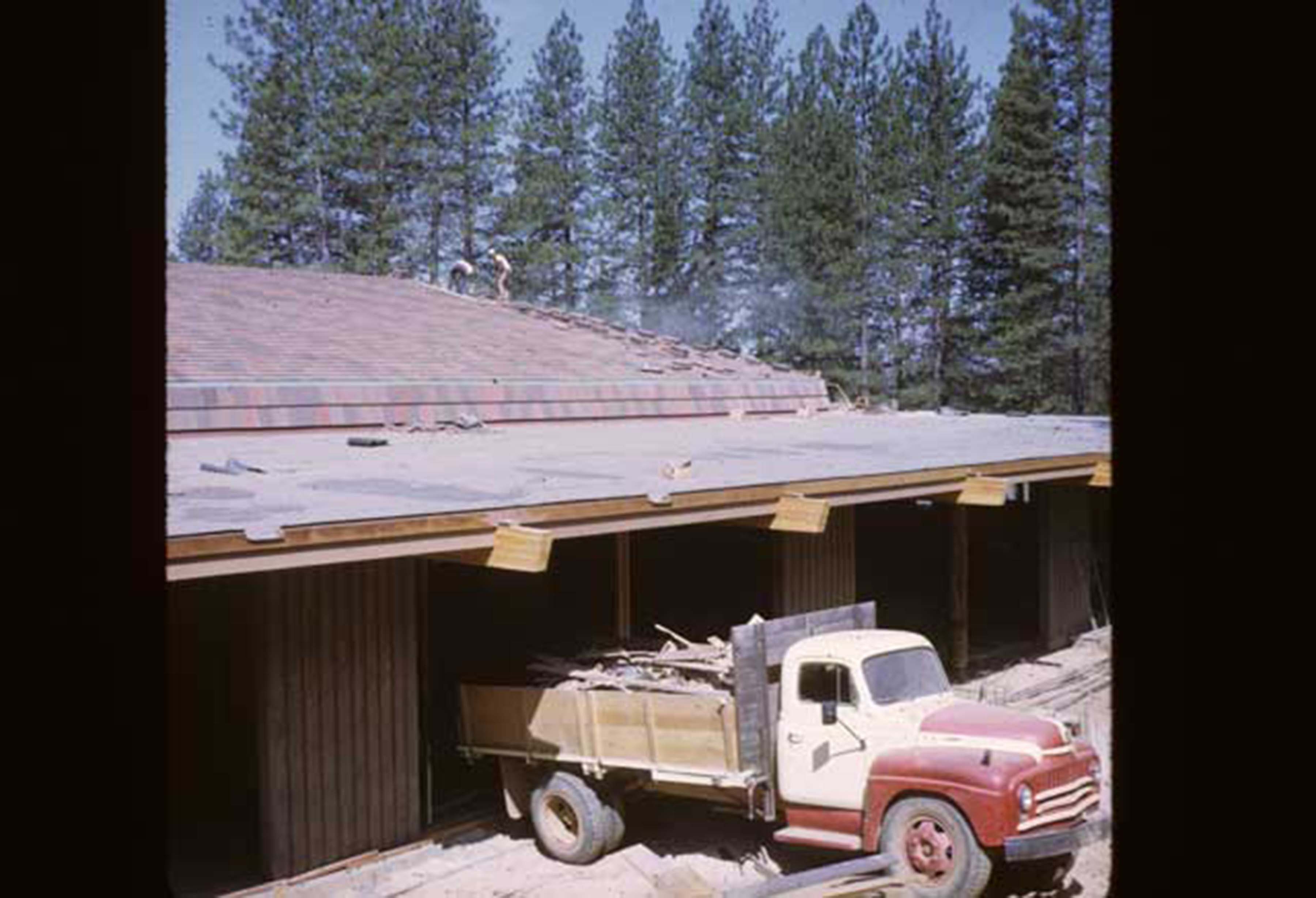 truck bringing in materials into building