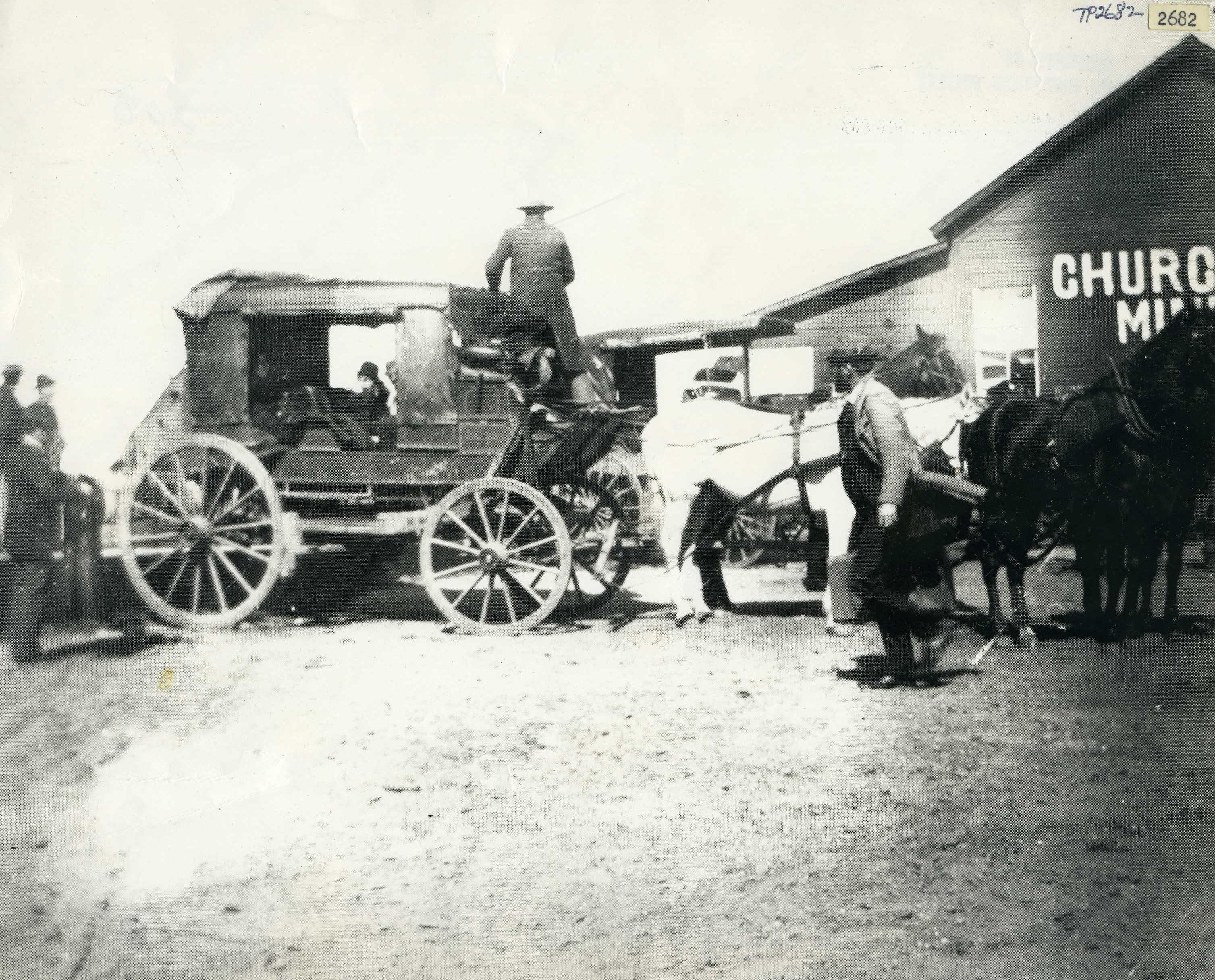 Horse and Carriage in front of building