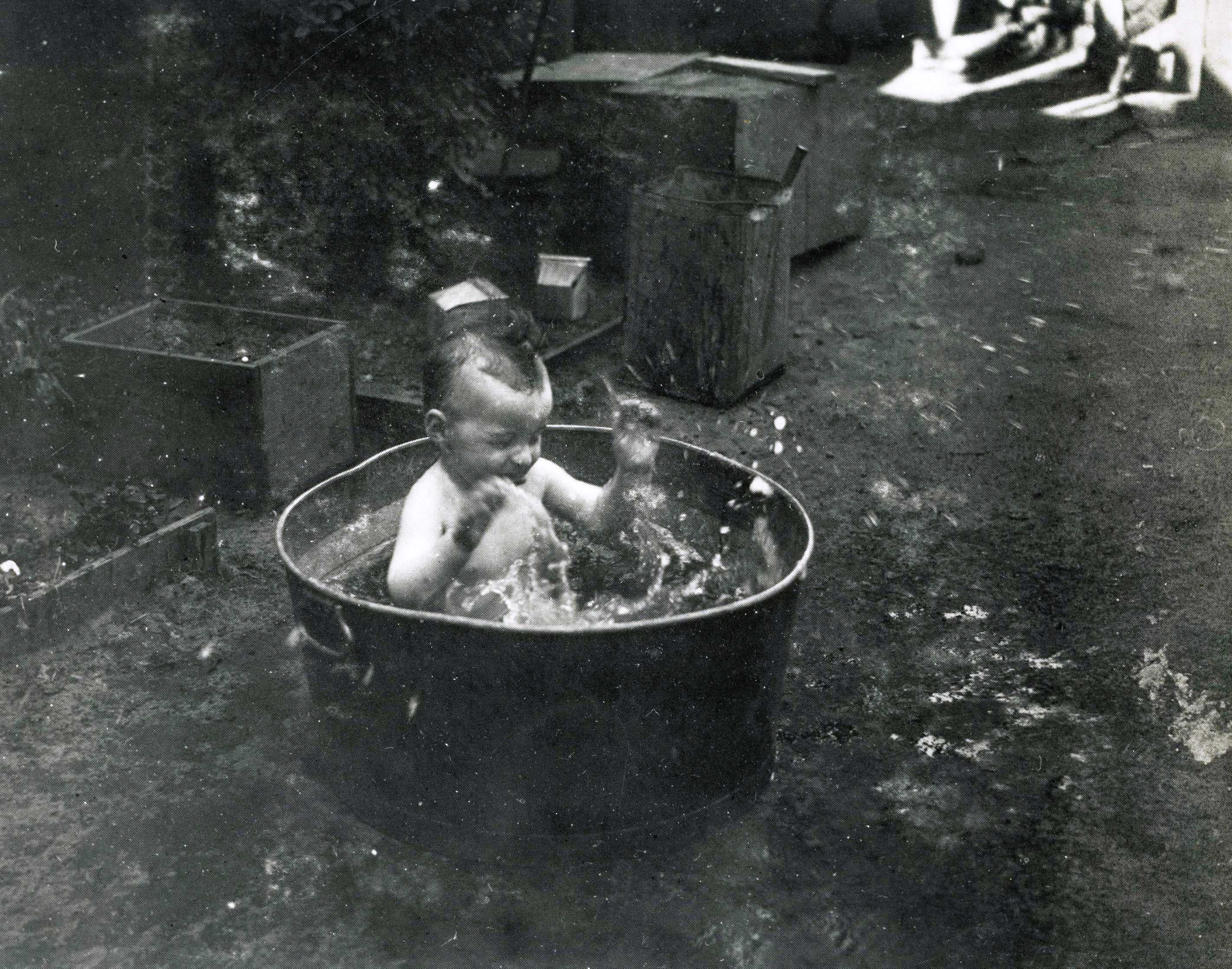 baby playing in water