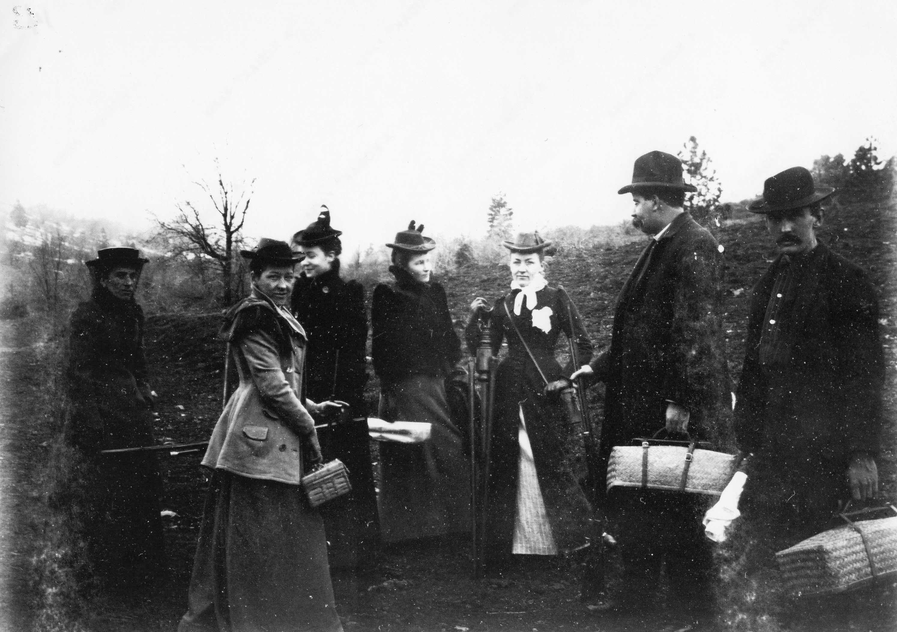 people in front of land